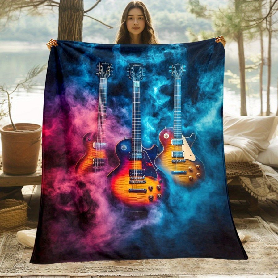 Electric throw blanket with a rock guitar design