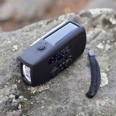 Wind-up solar emergency radio with torch and wrist strap